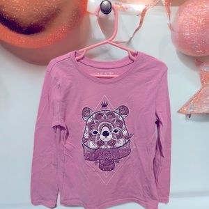 This is a long sleeved top from The Children’s Place. It is a size XS - 4